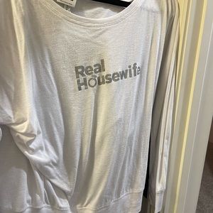 Bravo Real Housewives off the shoulder top